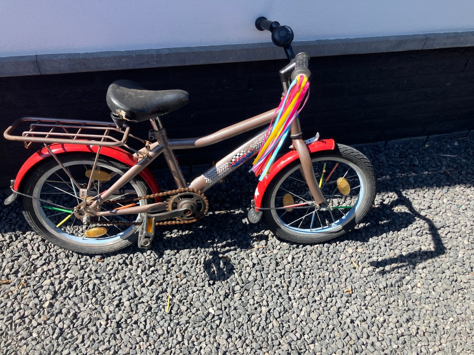 Kinderfiets stoer., Ophalen