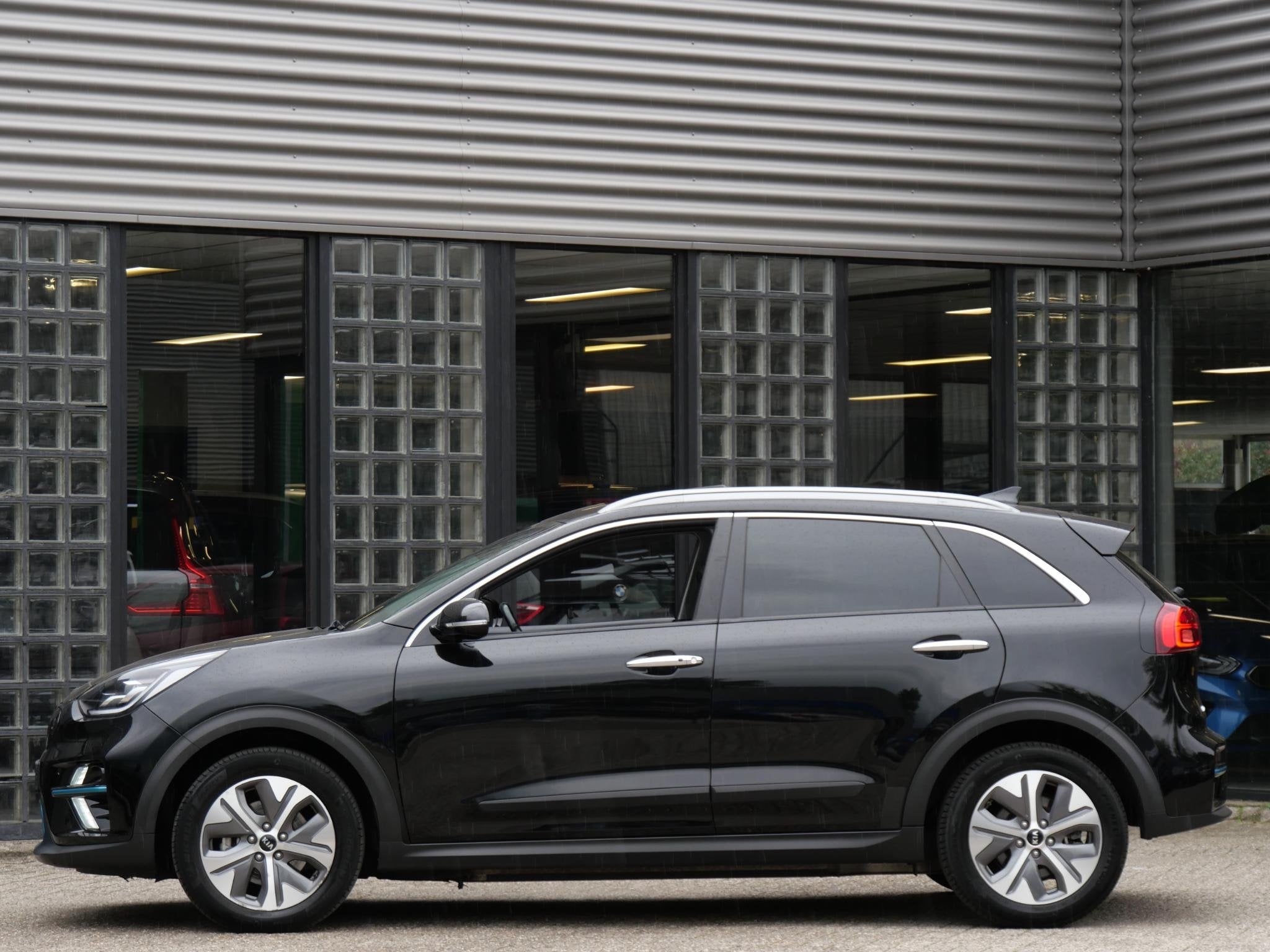 Kia e-Niro 64kWh DYNAMICPLUSLINE/ SCHUIFDAK/ SOH 97%/ NL-AUT, Auto's, Gebruikt, 1712 kg, Leder en Stof, Zwart