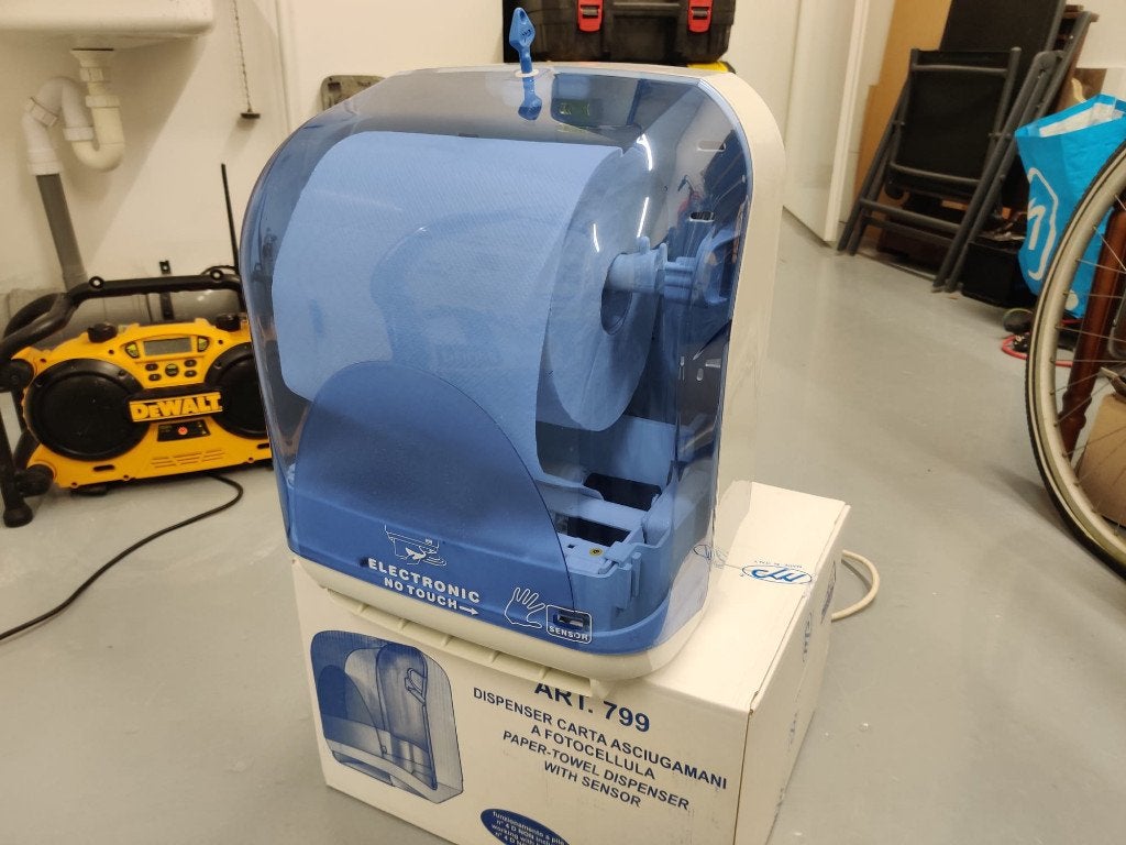 Electronische papier dispenser, Ophalen, Schoonmaakmiddel
