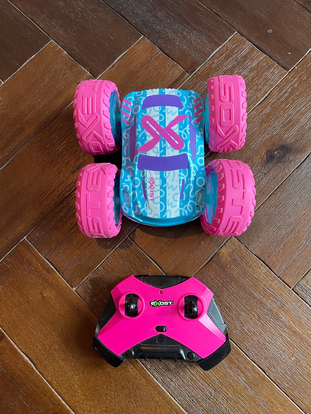 Exost 360 Cross Bestuurbare Auto Roze/Blauw, Ophalen, Zo goed als nieuw, Afstandsbediening