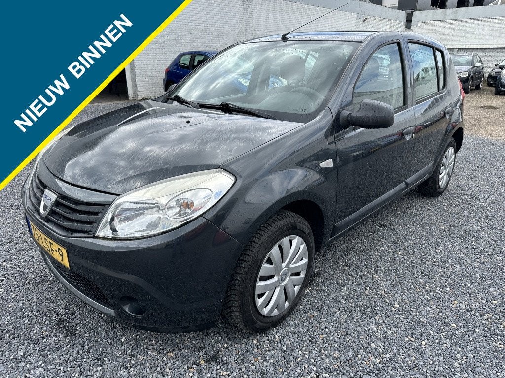 Dacia Sandero 1.2 Ambiance (bj 2010), Auto's, Gebruikt, 31 €/maand, Metallic lak, Origineel Nederlands