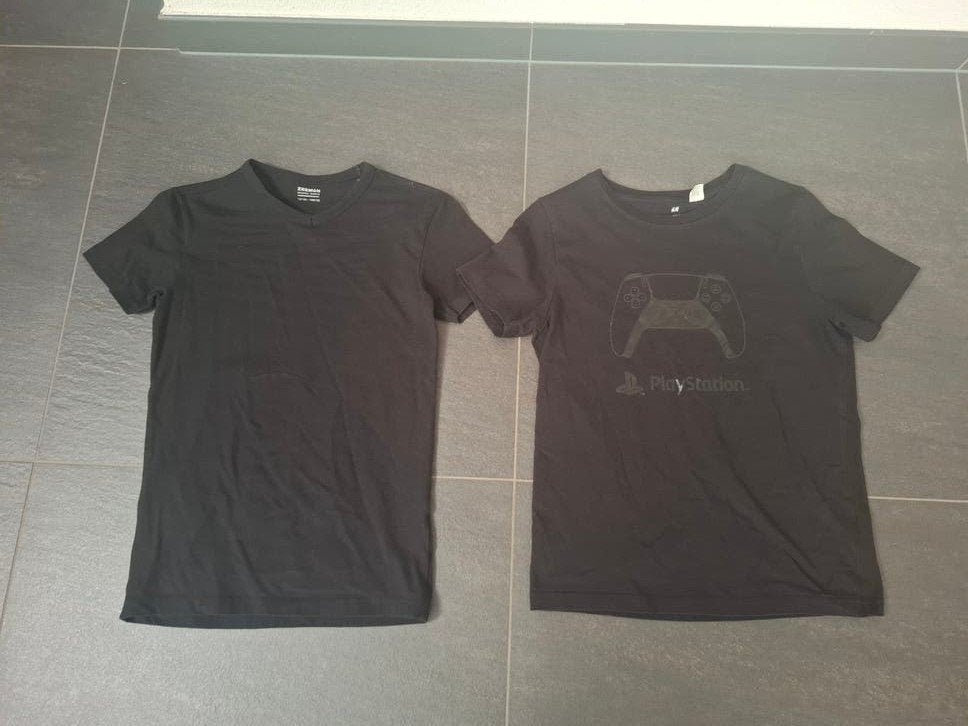 2x Zwarte T-shirts: Zeeman & H&M (Maat 146/152), Kleding | Heren, T-shirts, Ophalen of Verzenden, Zo goed als nieuw, Overige maten