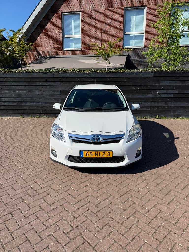 Toyota Auris 1.8 Hybrid 5-deurs CVT 2010 Wit, Auto's, Stof, Zwart, 4 cilinders, Wit