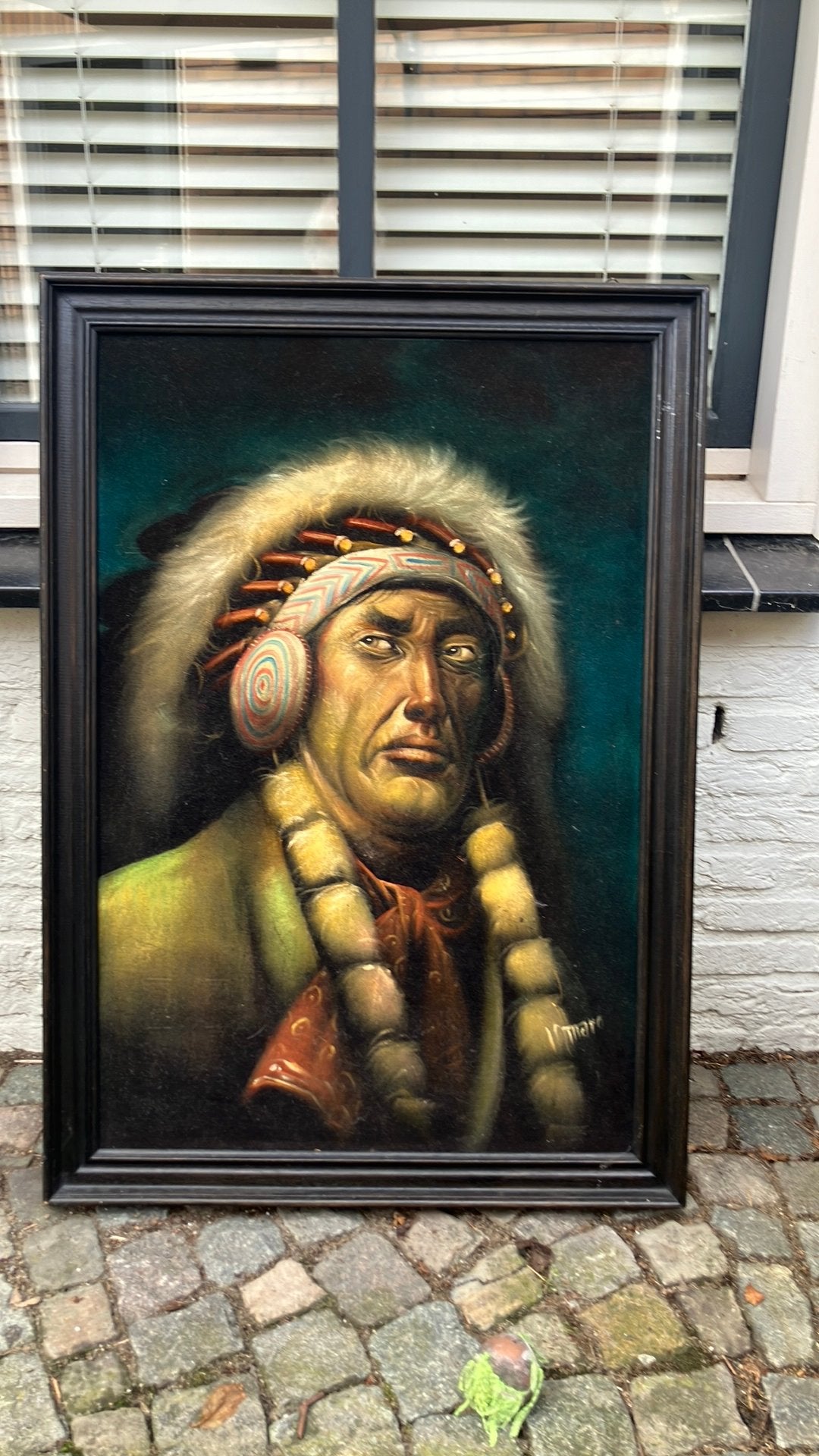 Schilderij indiaan met hoofdtooi, Ophalen