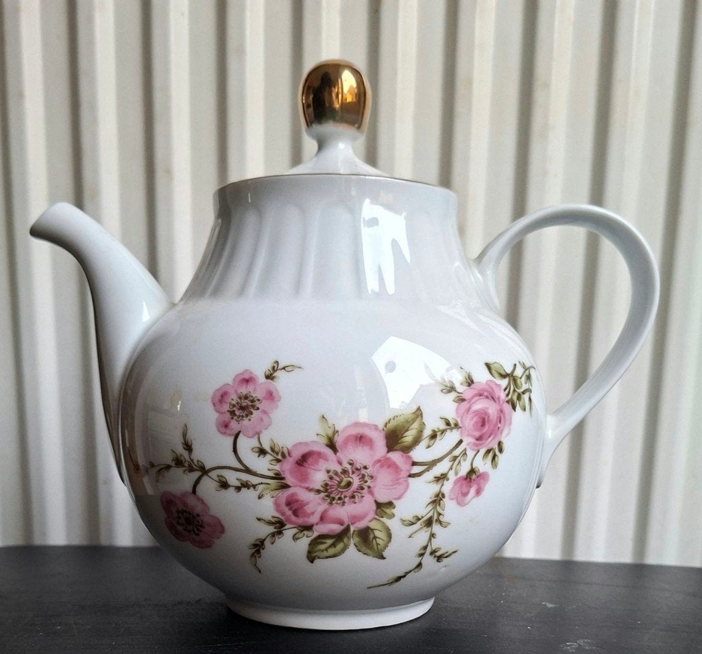 Porseleinen Theepot, Ophalen