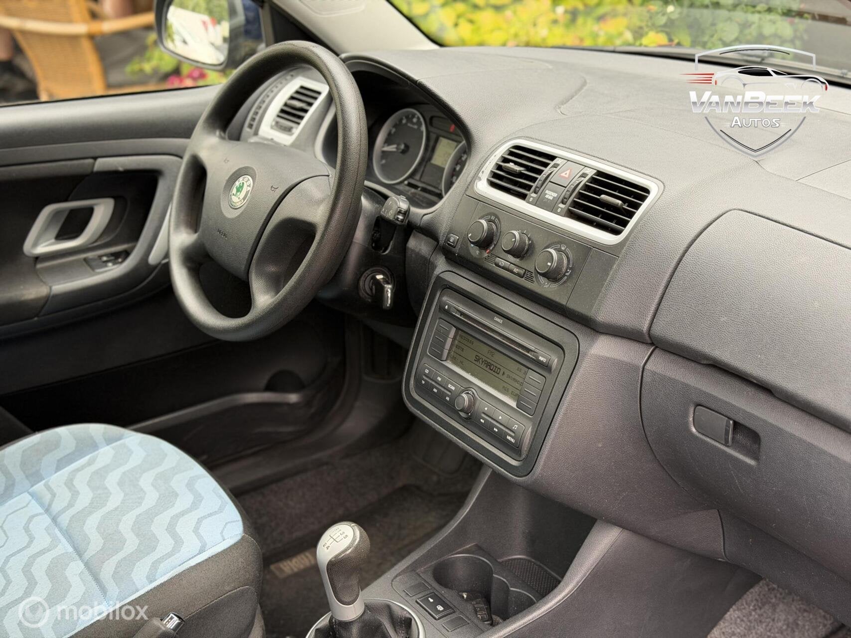 Skoda Fabia 1.4-16V Ambition Business Line, Auto's, Voorwielaandrijving, 4 cilinders, Blauw, Origineel Nederlands