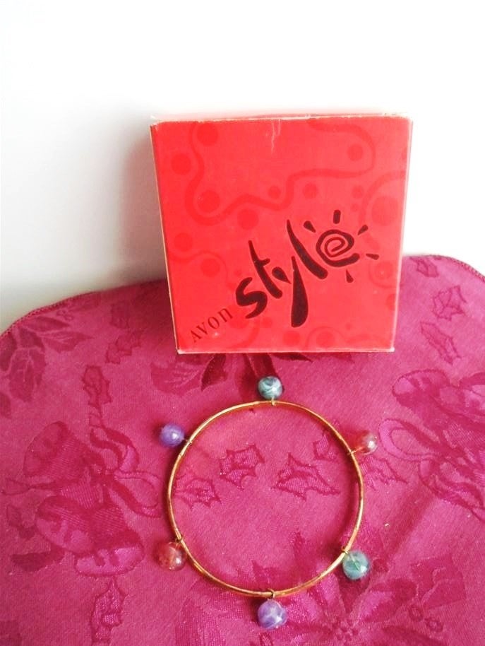 Avon Armband Romantic Fantasy. Jaren '80. Nieuw, Ophalen of Verzenden, Nieuw, Goud, Overige materialen
