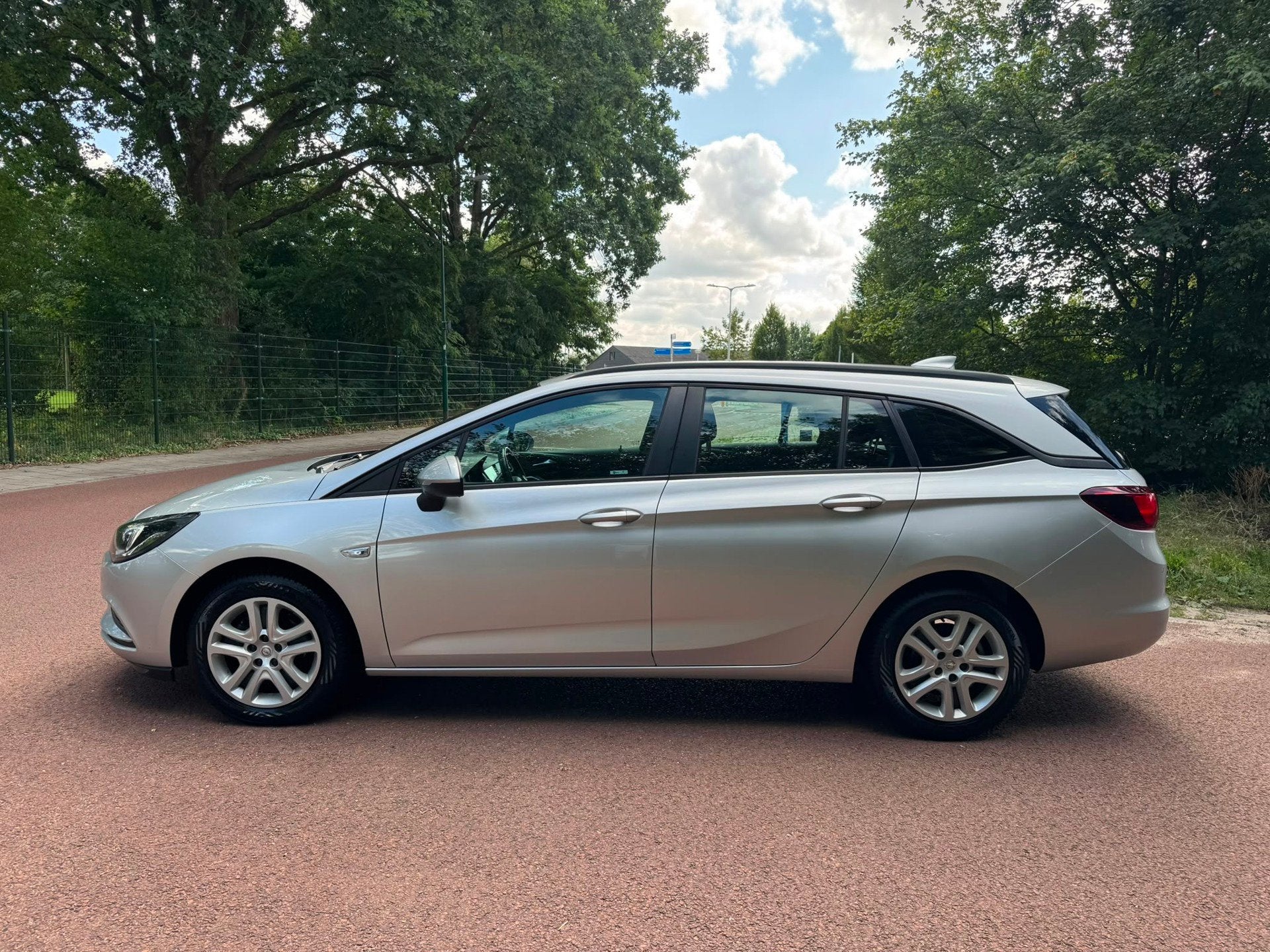 Opel Astra Sports Tourer 1.0 Online Edition / Navi / Airco /, Auto's, Voorwielaandrijving, Gebruikt, Euro 6, 1178 kg