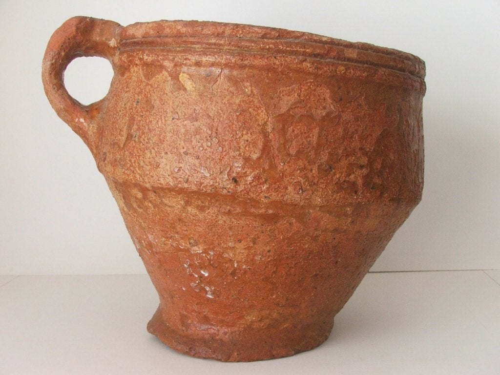 oude terracotta kan, Ophalen