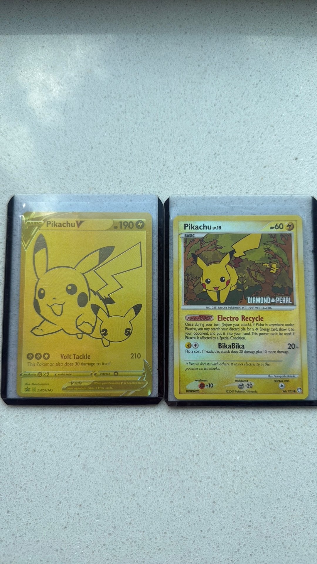 Pokemon Pikachu 145 & 94 beschadigd, Ophalen of Verzenden, Zo goed als nieuw