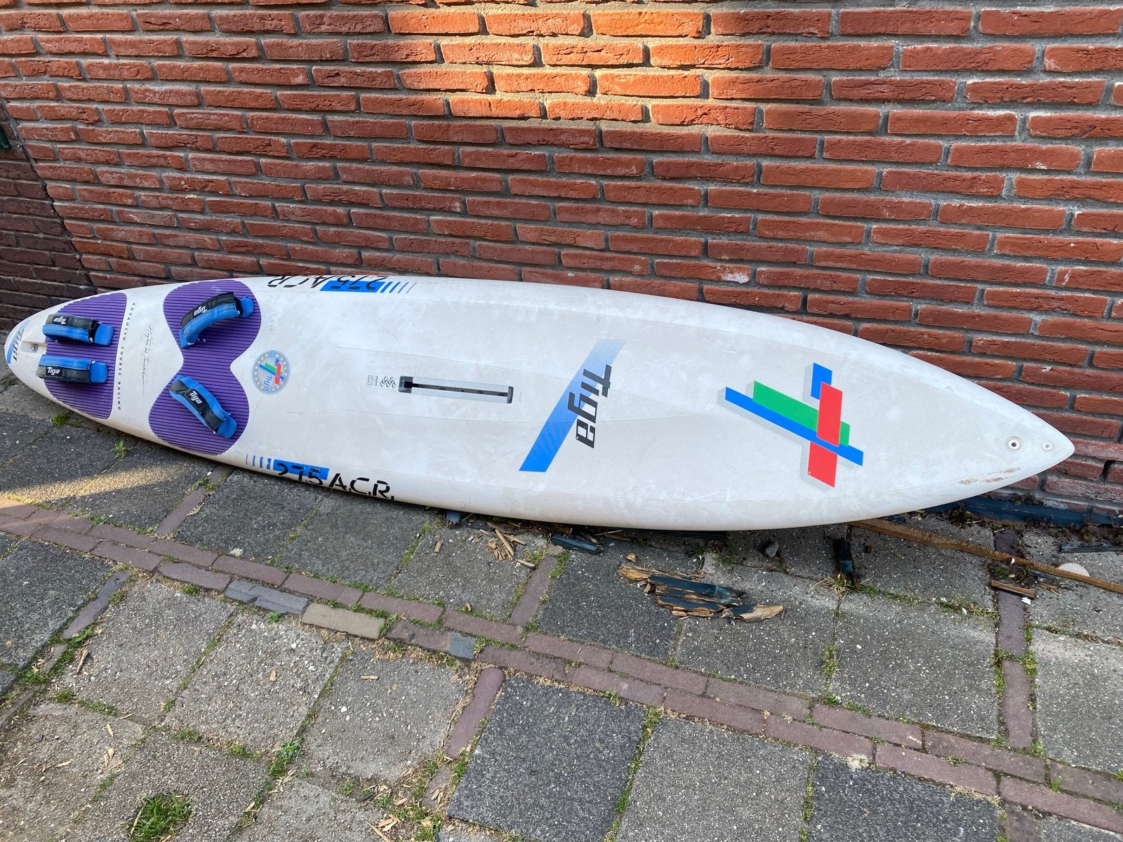 Windsurfplank Tiga - Gebruikt, Watersport en Boten, Met voetbanden, 250 tot 300 cm, Gebruikt, Plank