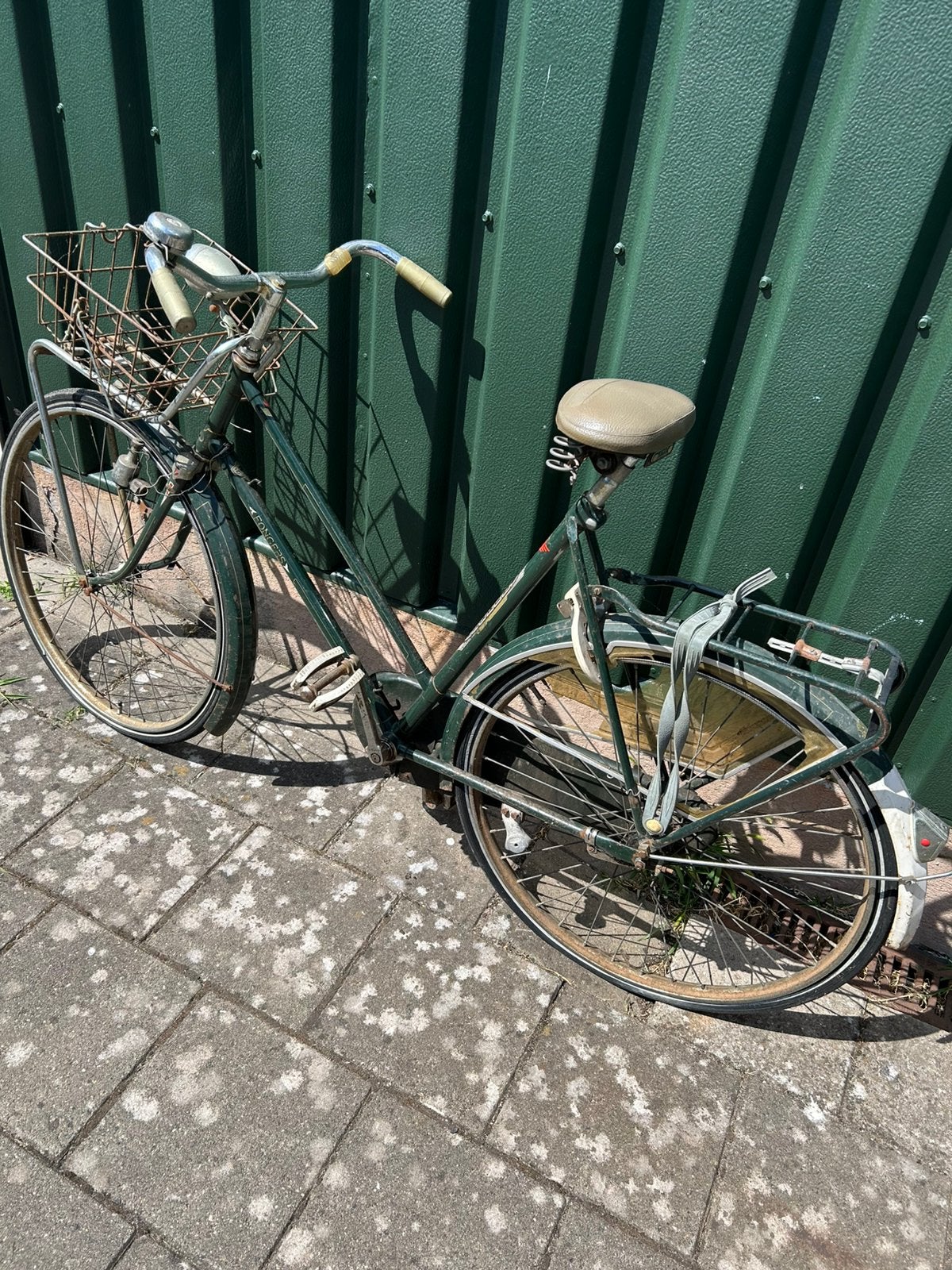 Fonger dames fiets., Ophalen