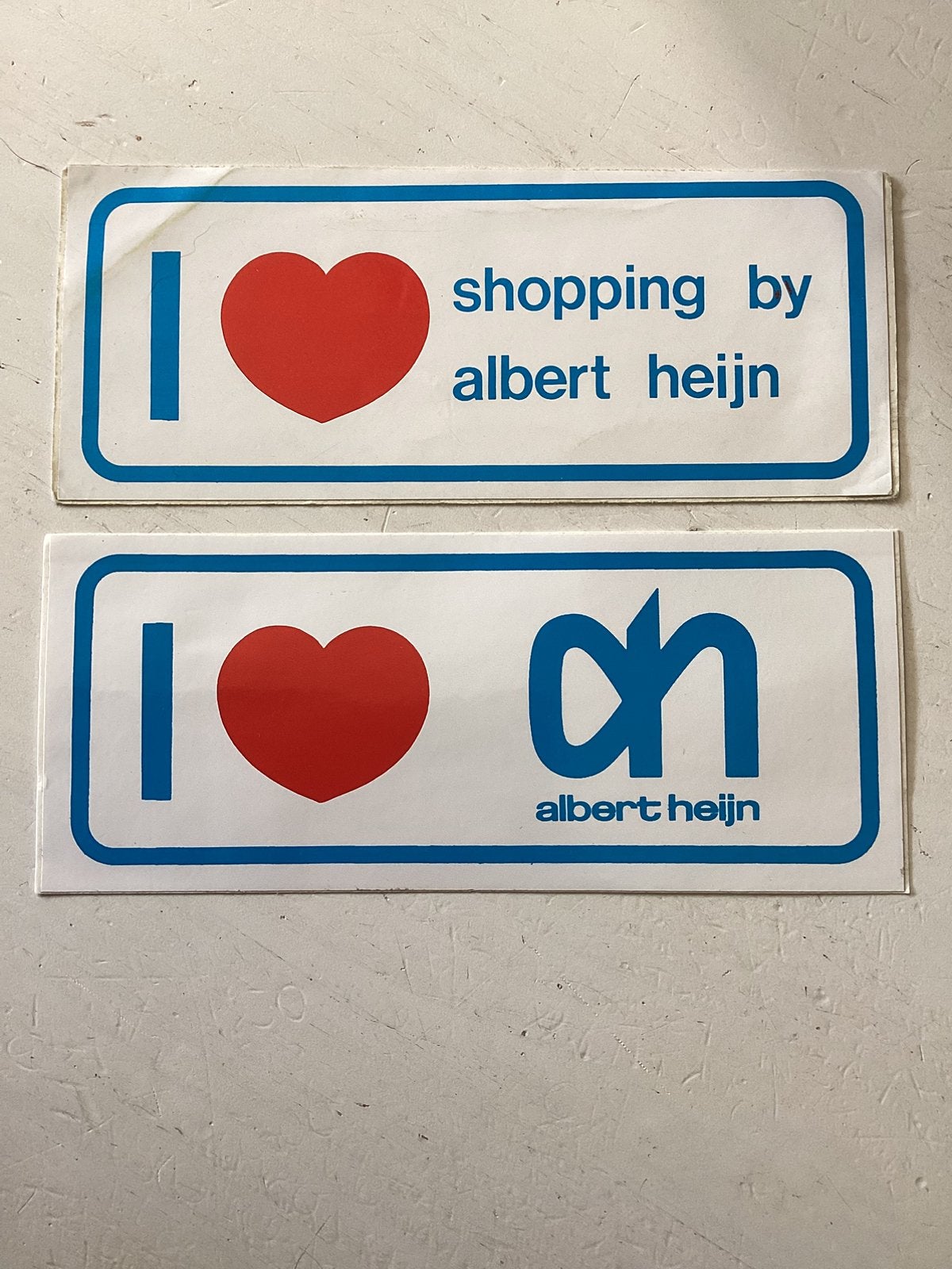 2 stickers Albert Heijn, Verzenden, Zo goed als nieuw, Winkel of Supermarkt