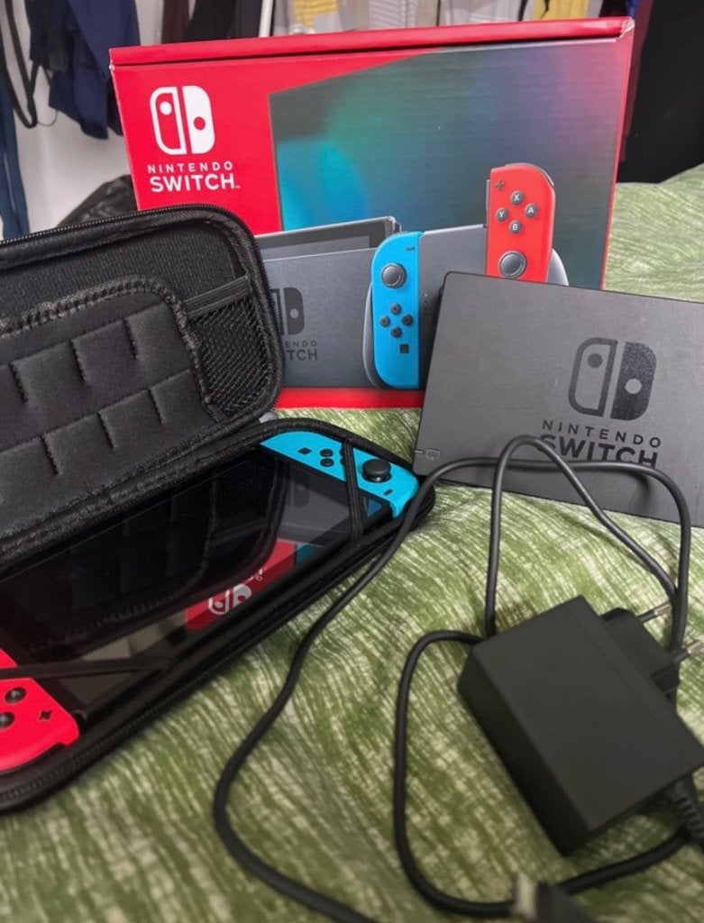 Nintendo Switch met 2 spellen - Zo goed als nieuw, Spelcomputers en Games, Games | Nintendo Switch, Ophalen, Overige genres, 2 spelers
