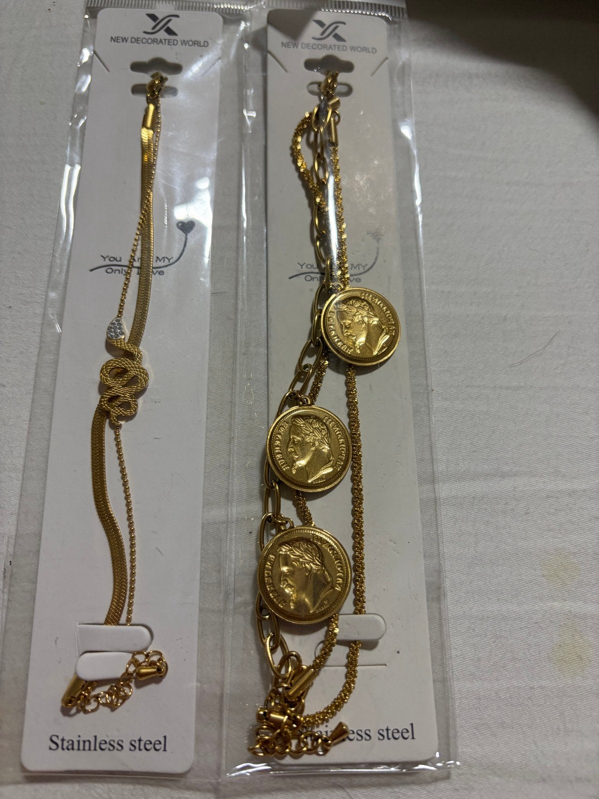 Gouden armbanden set - Roestvrij staal, Staal, Verzenden, Nieuw, Met bedels of kralen