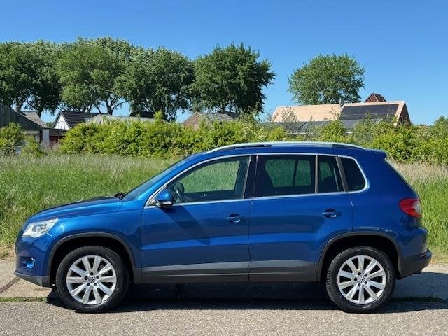 Volkswagen Tiguan 1.4 TSI Trend&Fun 4Motion ECC Audio-CD/Nav, Auto's, 13 km/l, Stof, Gebruikt, Zwart