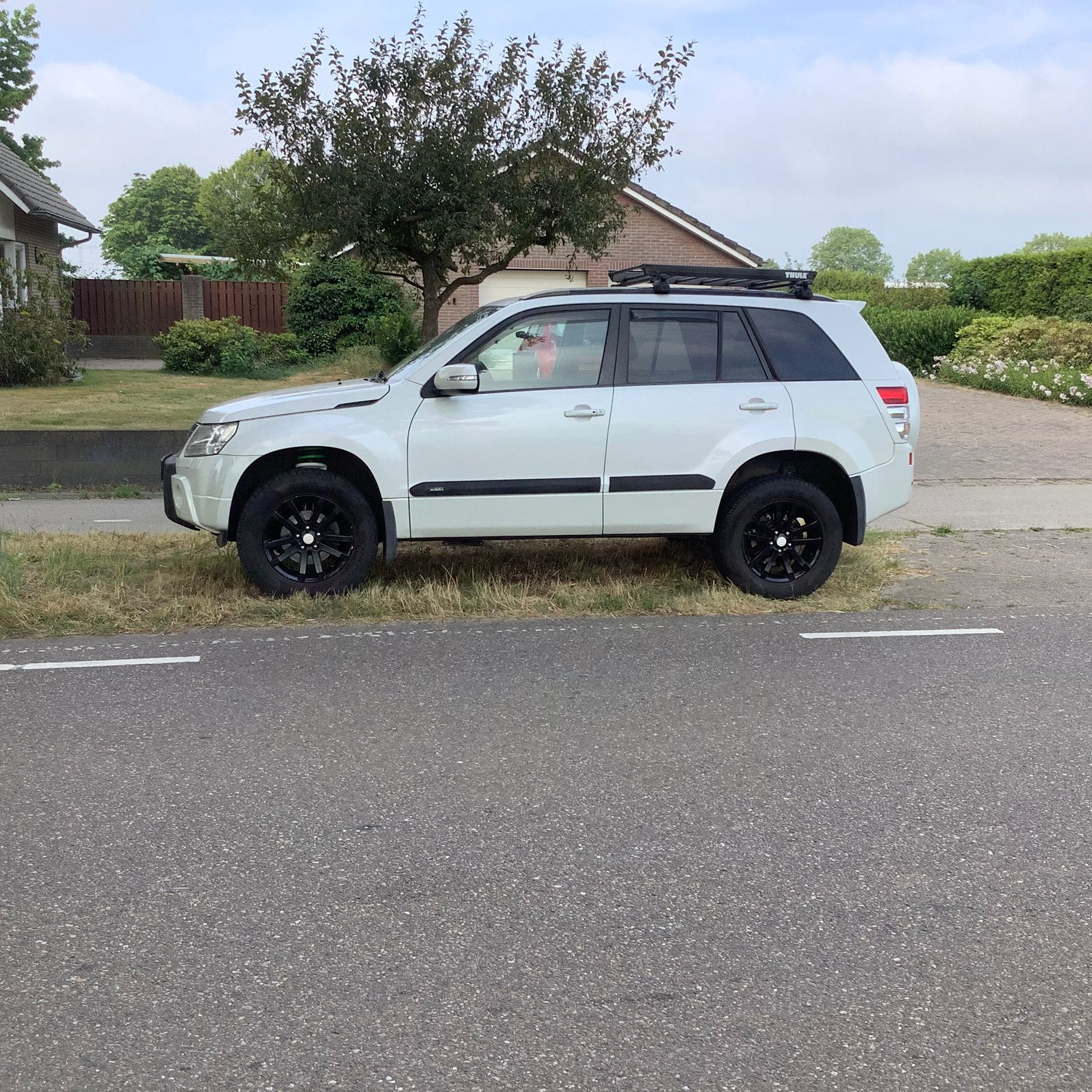Suzuki Grand Vitara 2.4 5D AUT High Executive 2009 Wit, Auto's, Automaat, Zwart, 4 cilinders, Grand Vitara