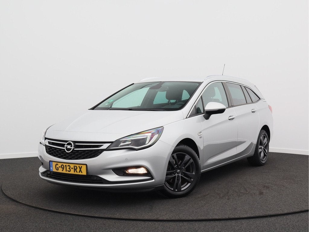Opel Astra Sports Tourer 1.0 Turbo 120 Jaar Edition/ lage km, Stof, Gebruikt, 1178 kg, 620 kg