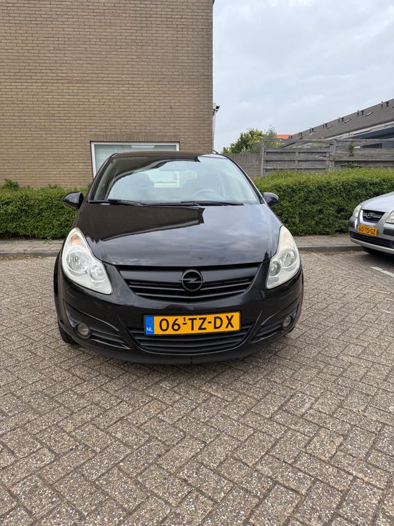 Opel Corsa 1.2 16V 3D WR 2007 Zwart, Auto's, Voorwielaandrijving, 450 kg, 40 €/maand, 4 cilinders