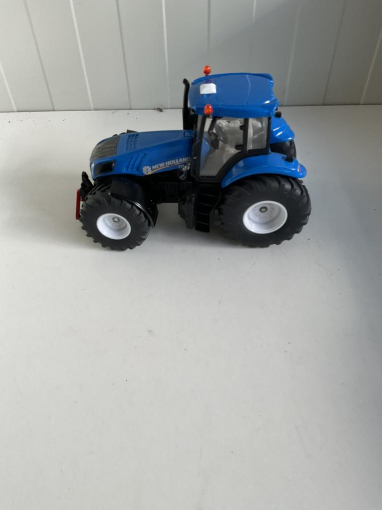 Siku New Holland T8. 390 zeer mooi, Ophalen, Zo goed als nieuw, Tractor of Landbouw, SIKU