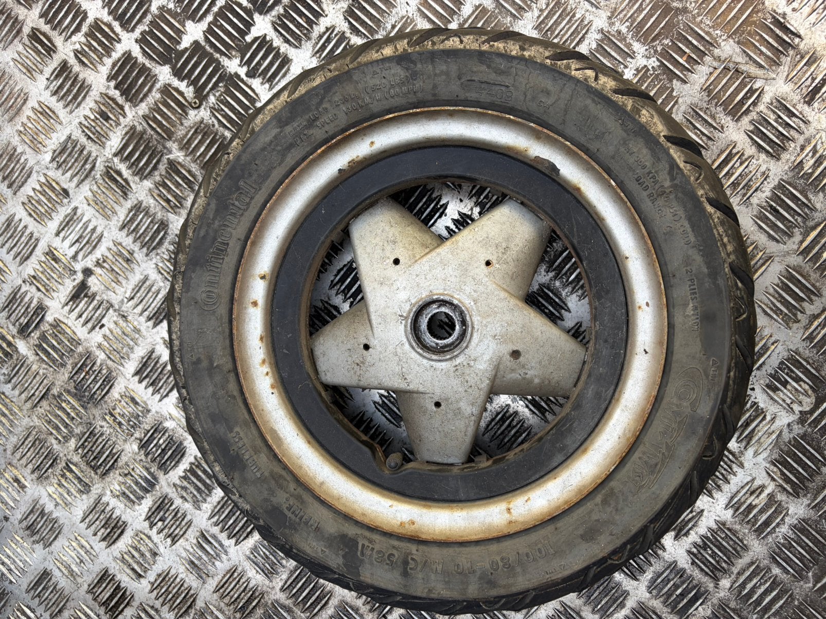piaggio quartz achter velg, Ophalen