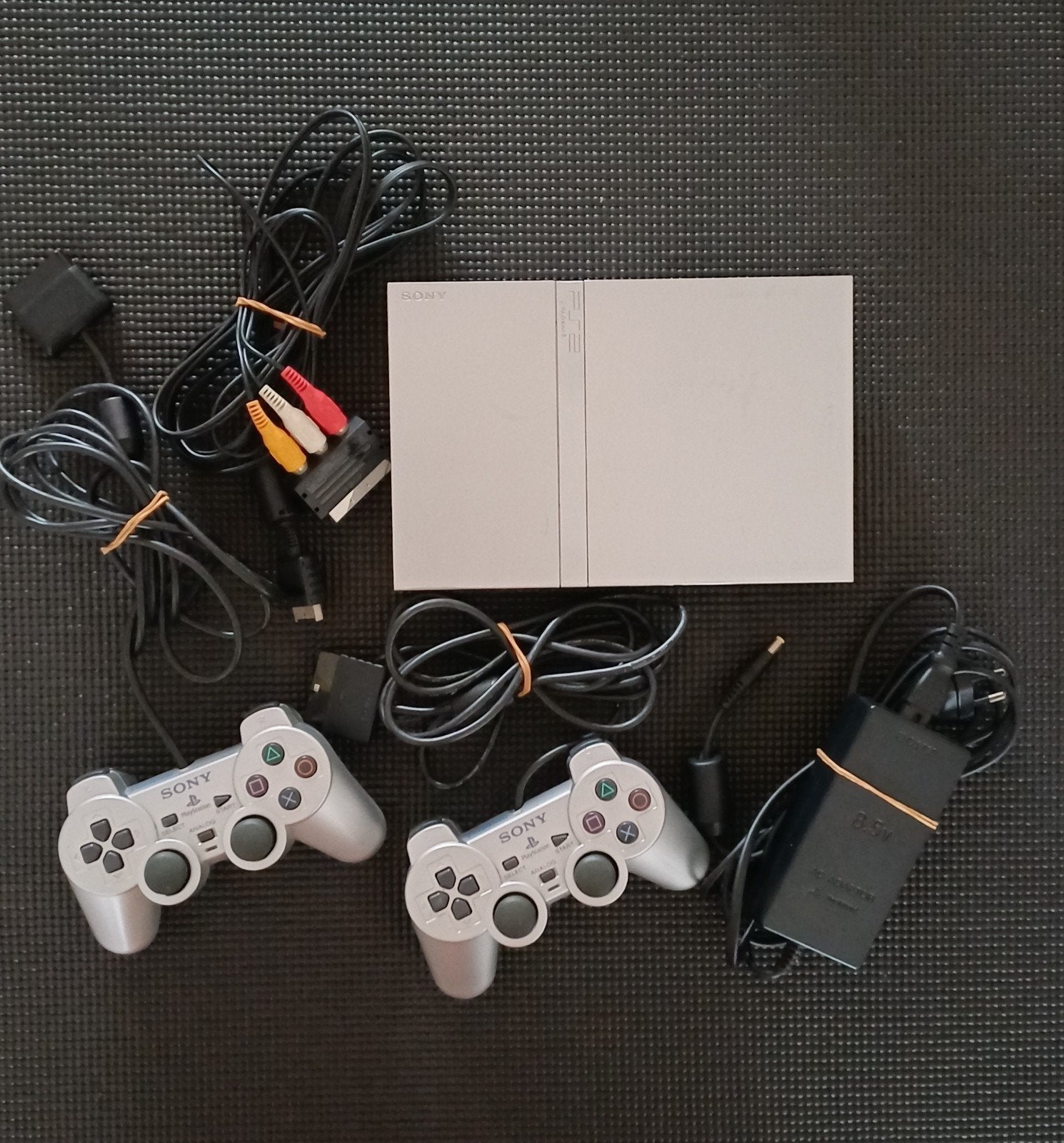 PlayStation 2 Slim met 5 spellen en geheugenkaart, Ophalen of Verzenden, Gebruikt