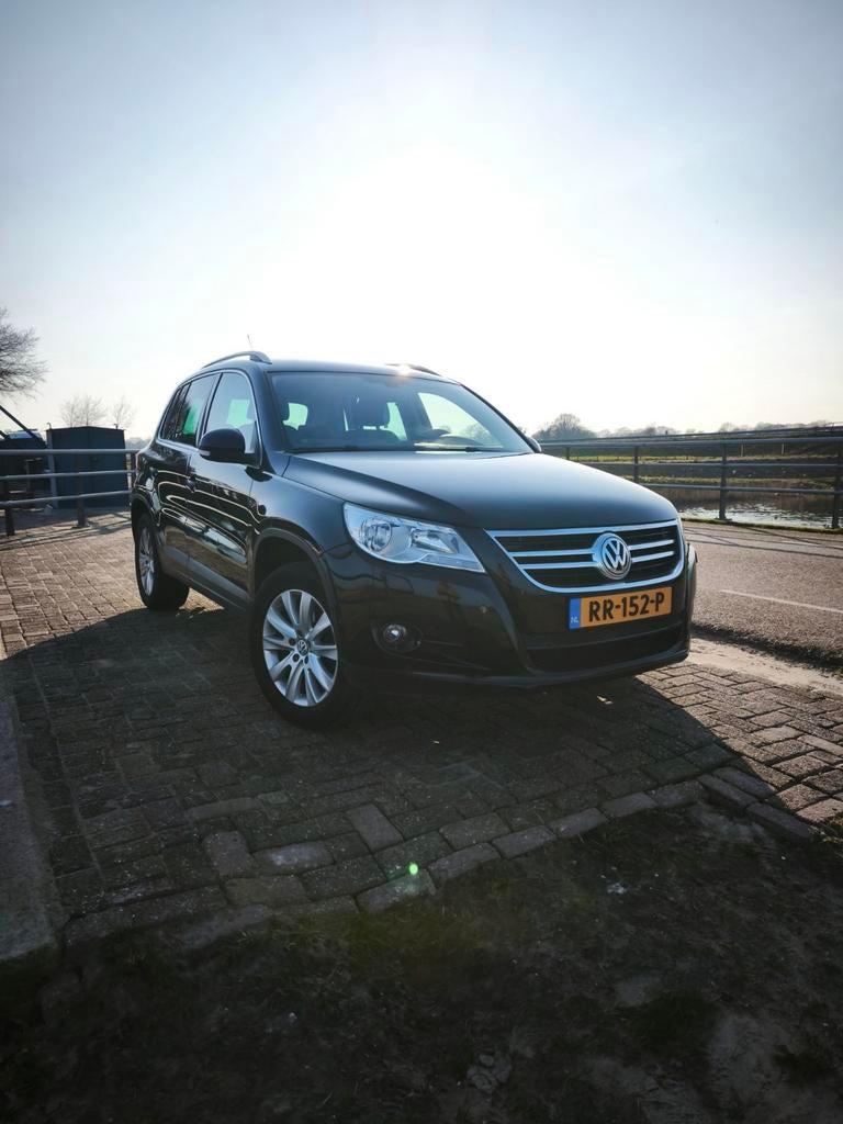 Volkswagen Tiguan 1.4 TSI 110KW 2010 Zwart, Auto's, Voorwielaandrijving, 15 km/l, 1800 kg, 4 cilinders