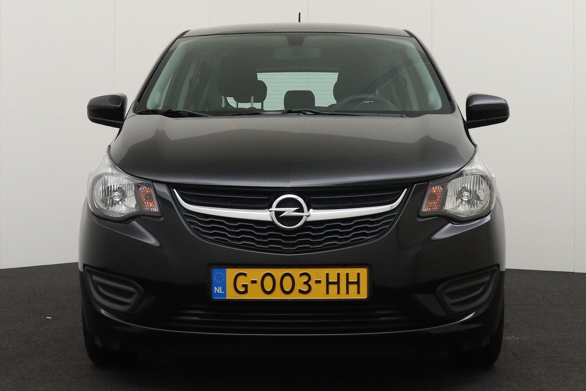 Opel KARL 1.0 120 Jaar Edition Airco Bluetooth Cruise, Stof, Gebruikt, Zwart, Origineel Nederlands