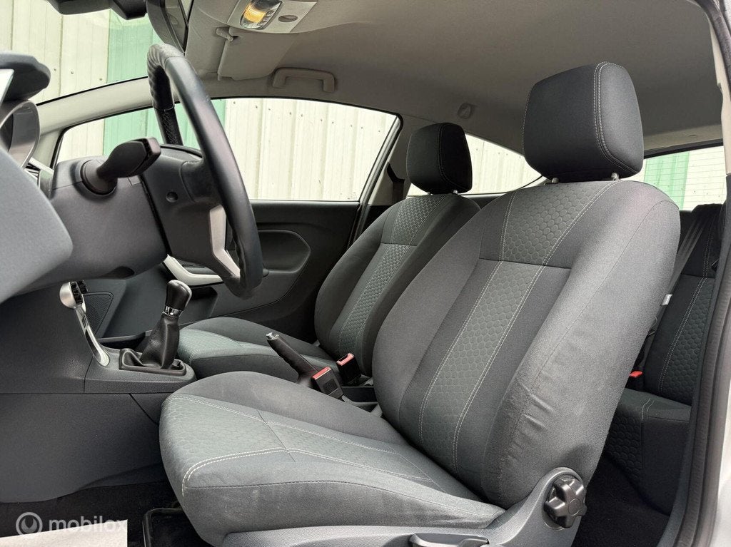 Ford Fiesta 1.25 Titanium | Climate | Parkeer Sens. | Aux, Auto's, Voorwielaandrijving, Euro 5, Stof, 4 cilinders