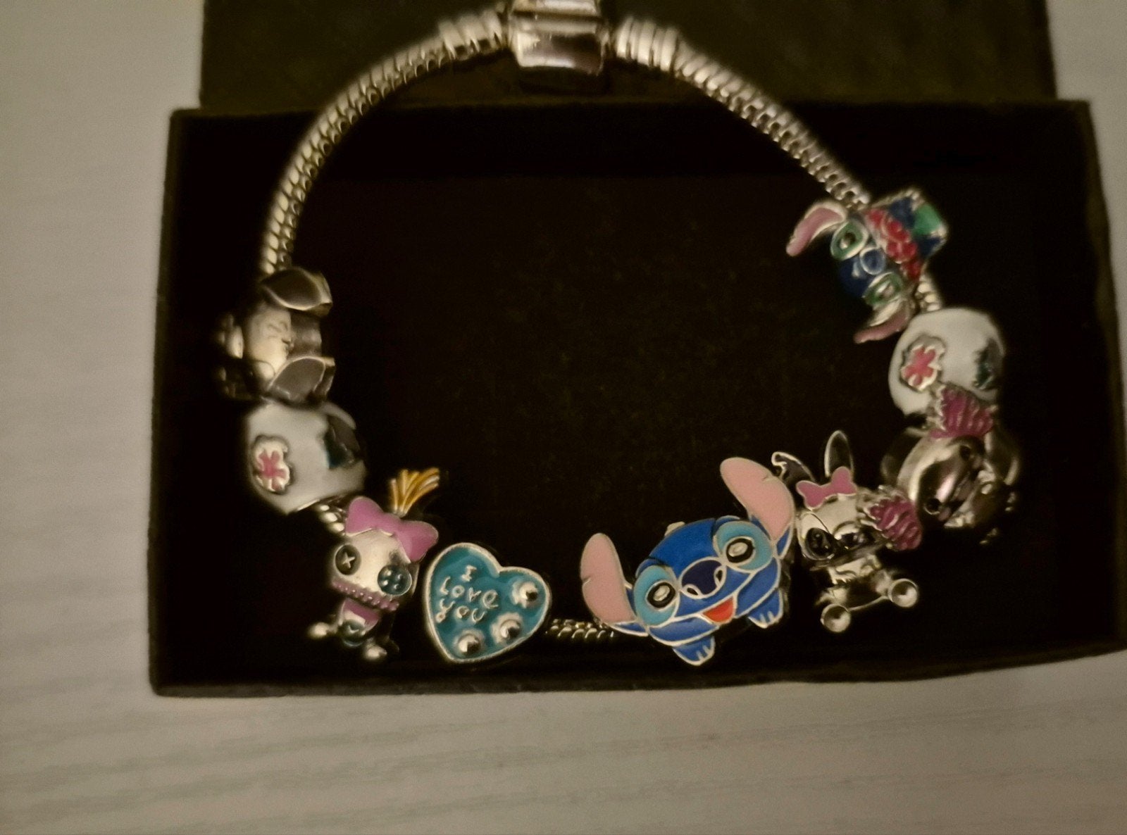 Stitch bedelarmband 17 cm NIEUW, Ophalen of Verzenden, Nieuw, Staal, Met bedels of kralen