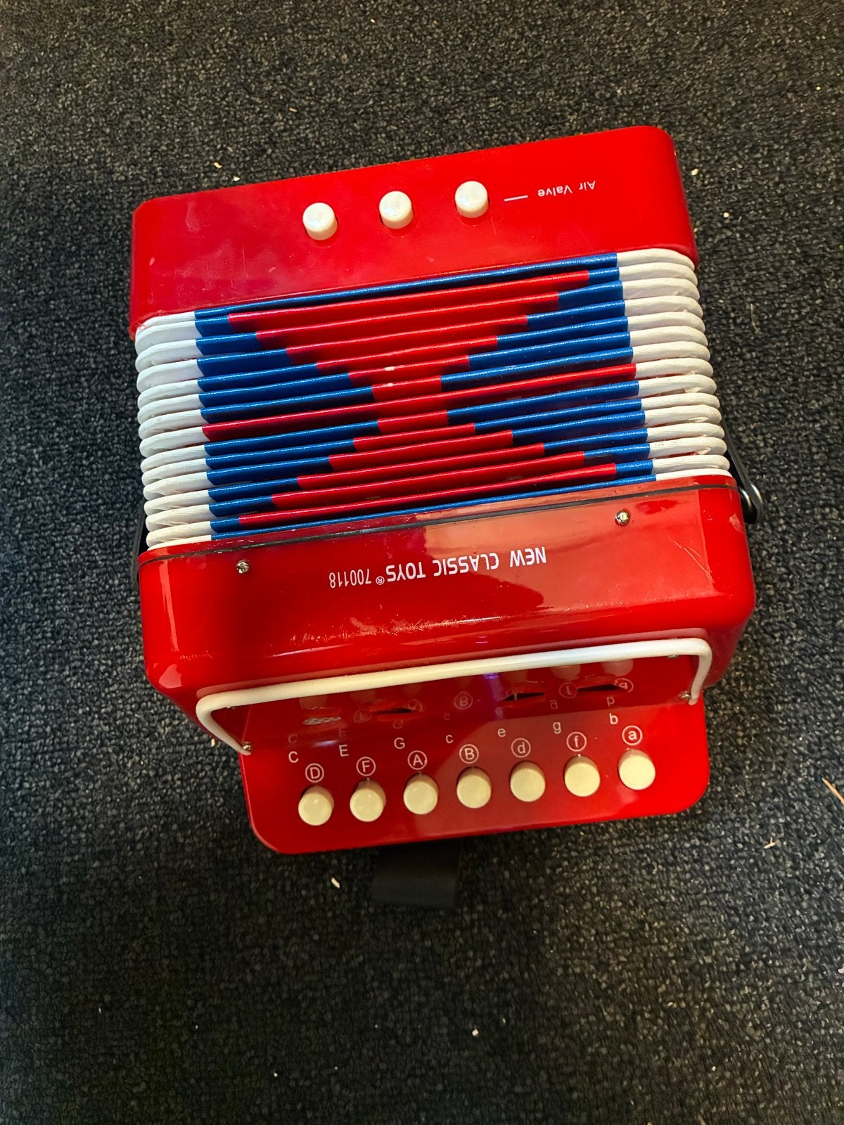 Rode speelgoedaccordeon - New Classic Toys, Overige merken, Gebruikt, Overige formaten, Ophalen of Verzenden