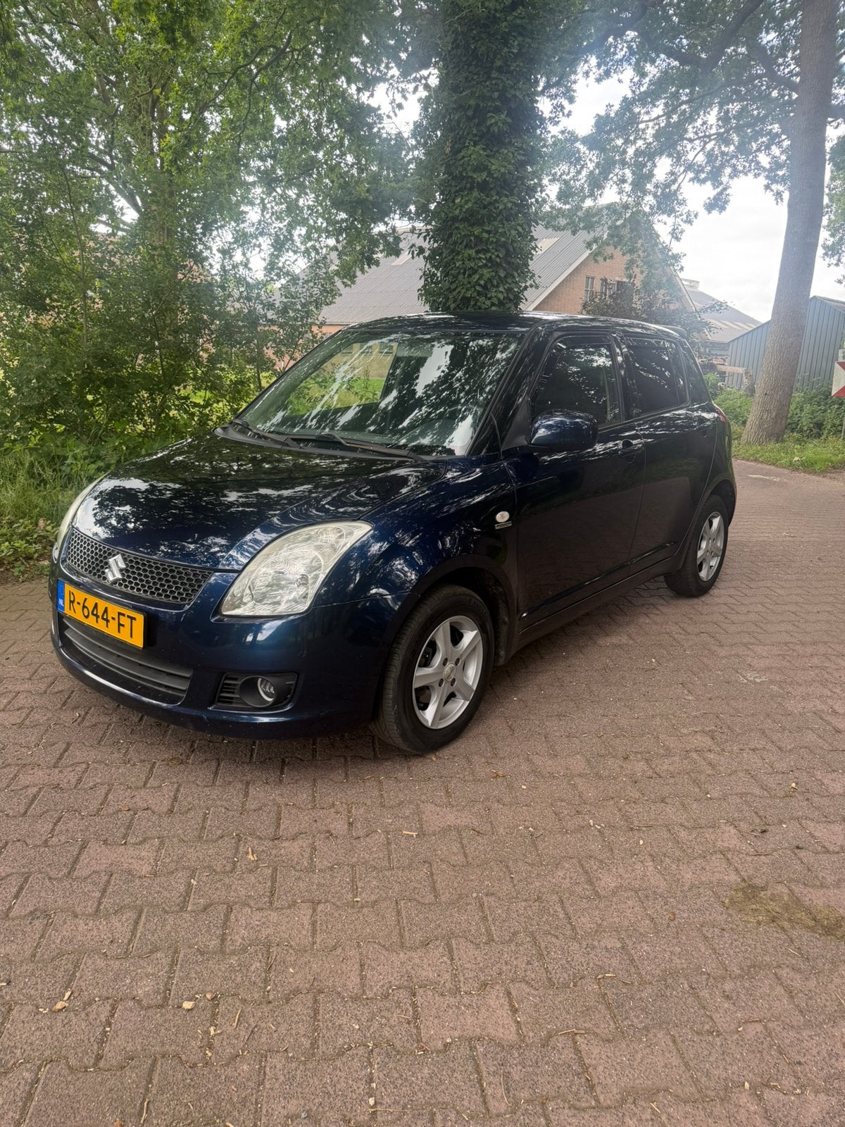 Suzuki Swift 1.3 5DRS 4WD 2009 Blauw 4x4, Auto's, Suzuki, 40 €/maand, Zwart, Swift, Stoelverwarming