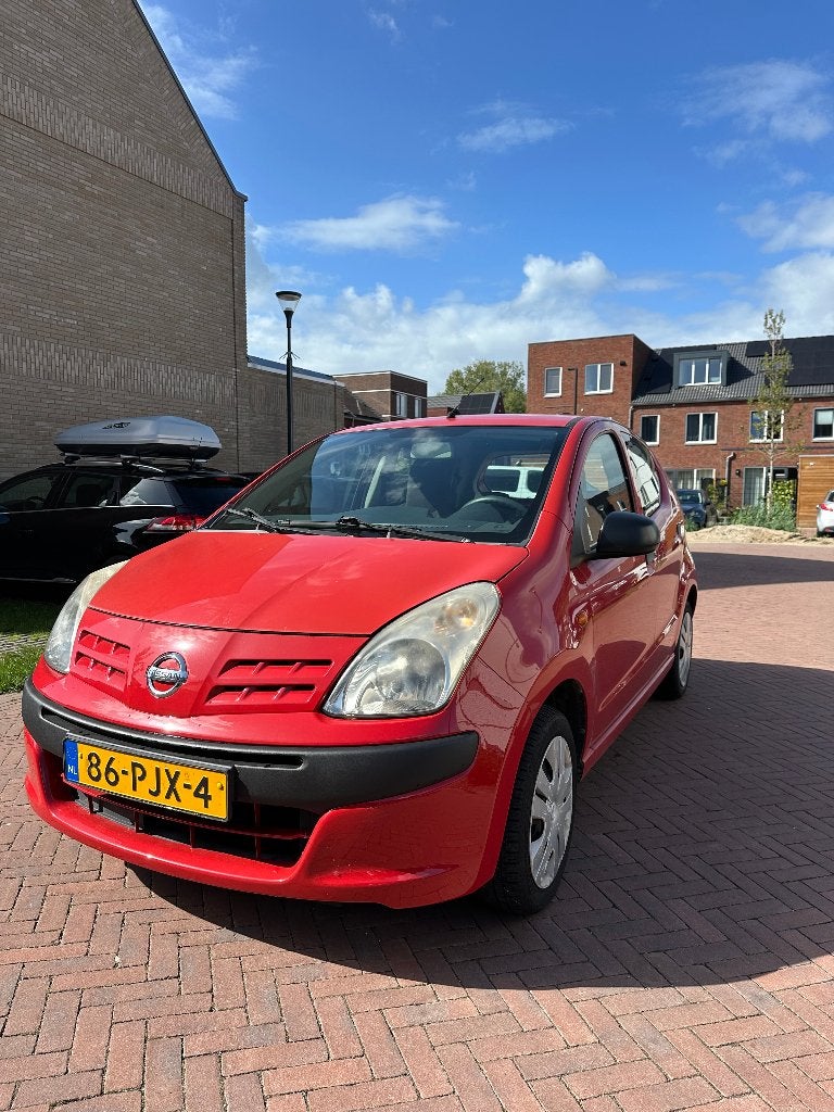 Nissan Pixo 1.0 50KW 5D 2011 Rood (suzuki alto), Auto's, Voorwielaandrijving, Stof, 4 stoelen, Origineel Nederlands