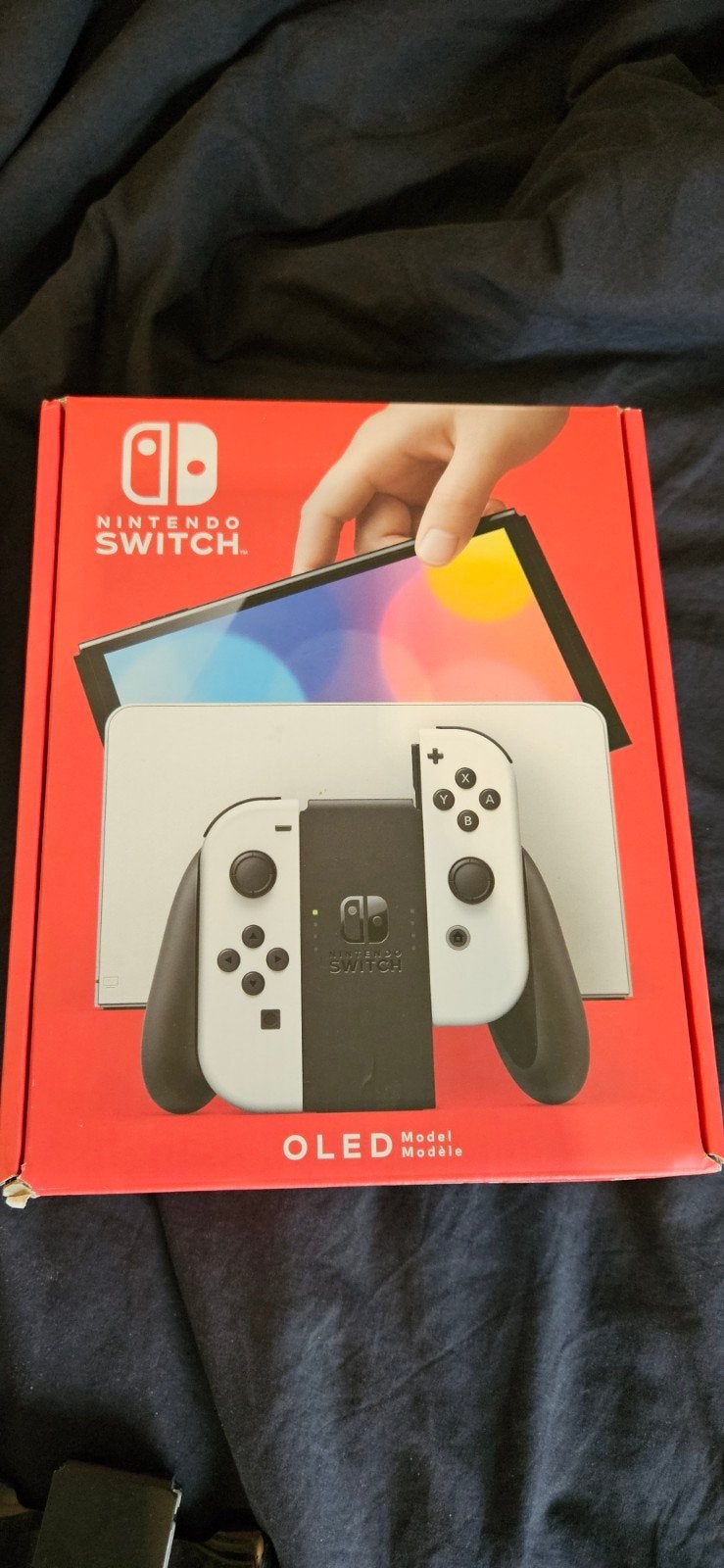 Nintendo Switch v2 OLED + twee spellen + extra's