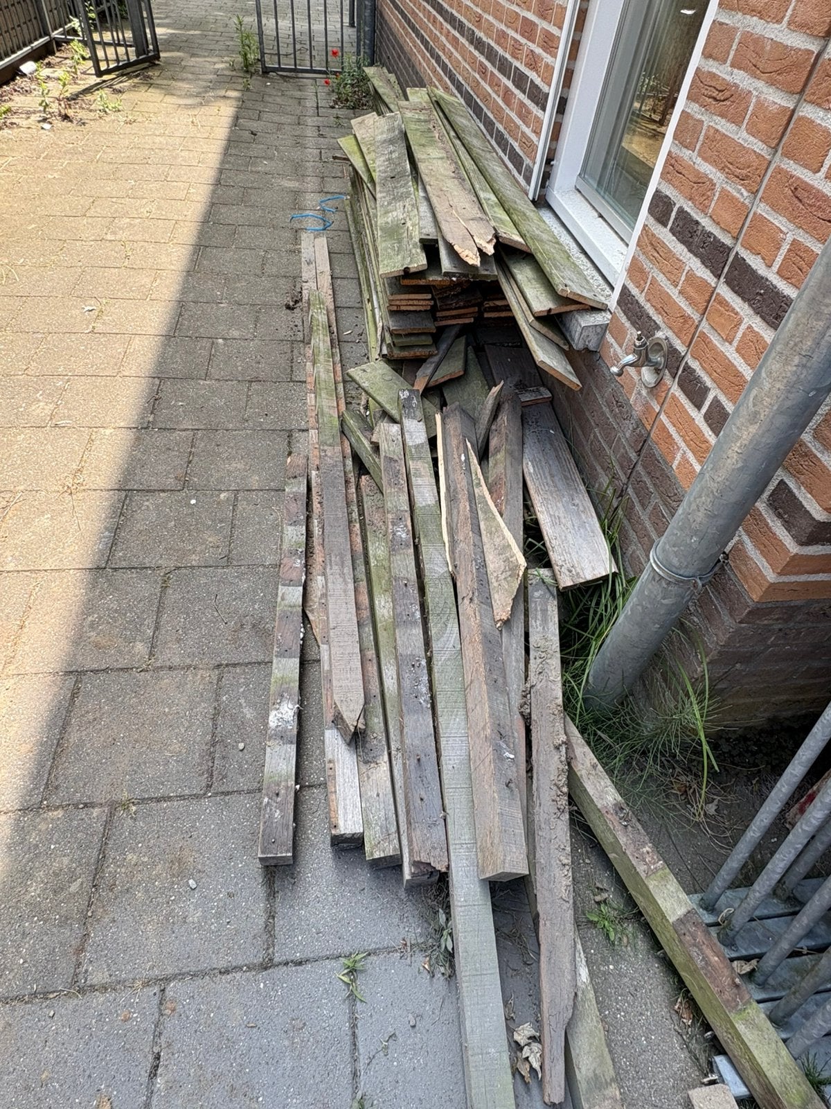 Hout van schutting gebruikt, Minder dan 3 m³, Ophalen