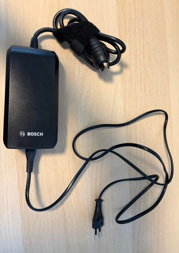 Bosch E-Bike oplader 2A, Fietsen en Brommers, Ophalen of Verzenden, Zo goed als nieuw