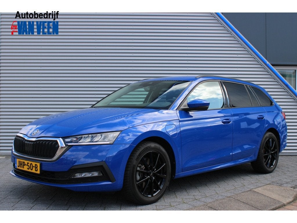 Skoda Octavia Combi 1.4 TSI iV PHEV Business Editon | PDC |, Auto's, Automaat, Stof, Gebruikt, 4 cilinders