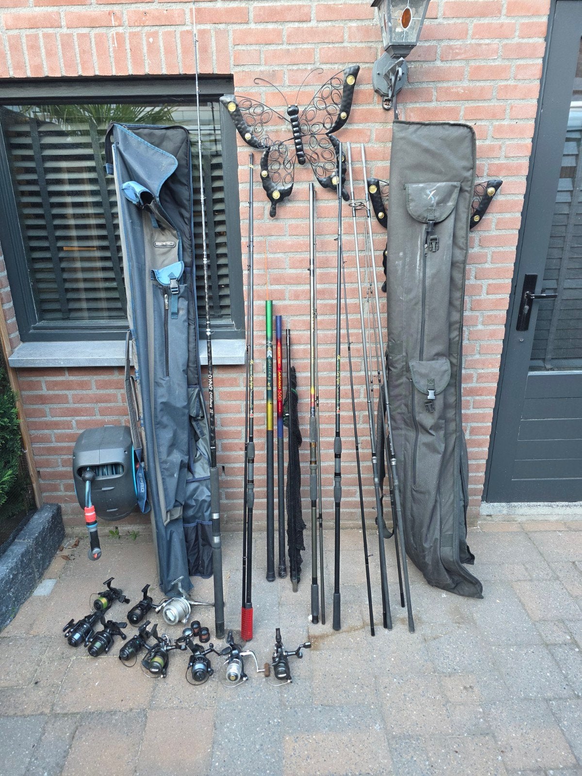 Grote partij vishengels, molens en tassen, Watersport en Boten, Ophalen of Verzenden, Gebruikt, Werphengel