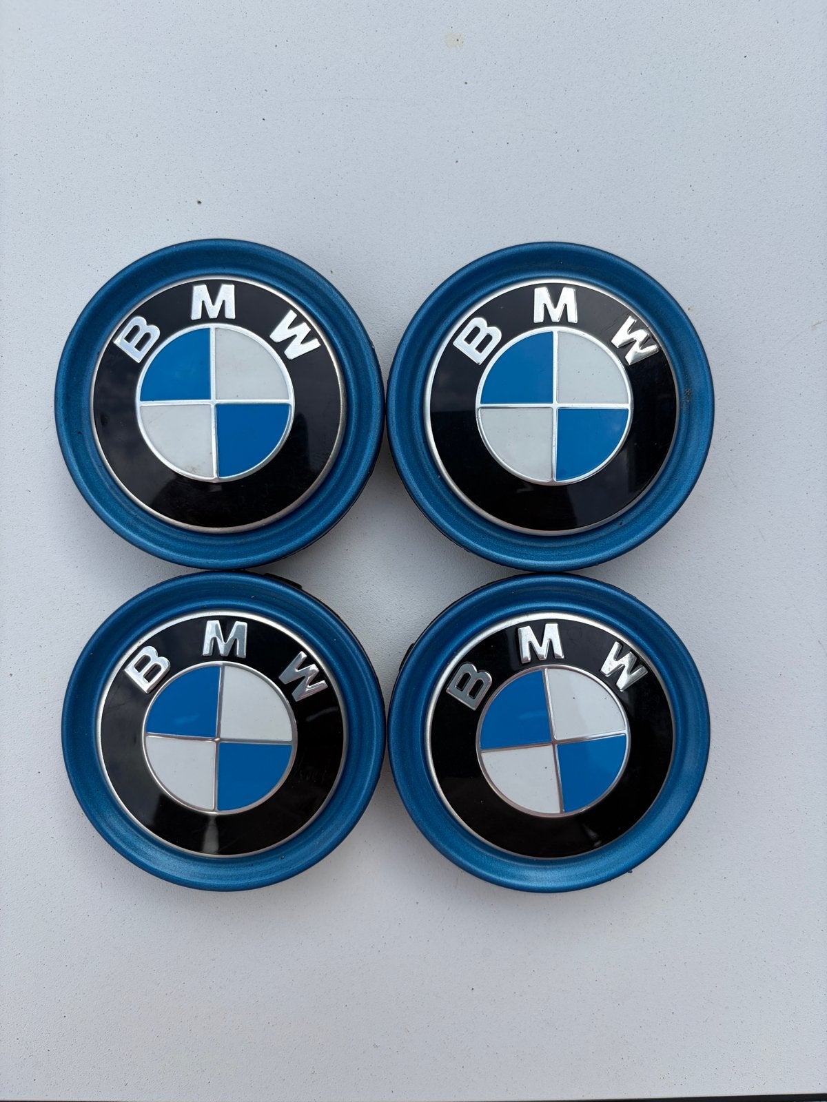 4x originele BMW naafdoppen blauw/zwart, Auto diversen, Ophalen of Verzenden, Gebruikt