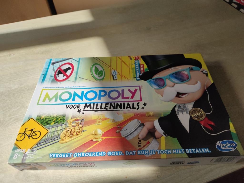 Monopoly voor Millennials - Zo goed als nieuw, Hobby en Vrije tijd, Gezelschapsspellen | Bordspellen, Zo goed als nieuw, Drie of vier spelers