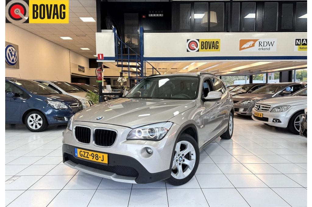 BMW X1 sDrive18i Exec Automaat Bovag Garantie (bj 2012), Auto's, Euro 5, Stof, 150 pk, Bedrijf