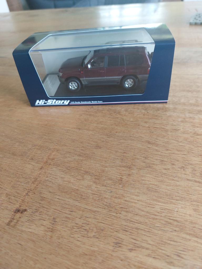 MODELAUTO 1-43 HI-STORY TOYOTA LANDCRUISER 2000 ROOD, Ophalen of Verzenden, Zo goed als nieuw, Auto, Overige merken