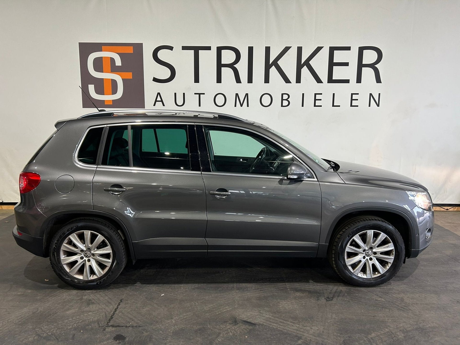 Volkswagen Tiguan 1.4 TSI Sport&Style, Auto's, Voorwielaandrijving, Euro 5, 15 km/l, Zwart