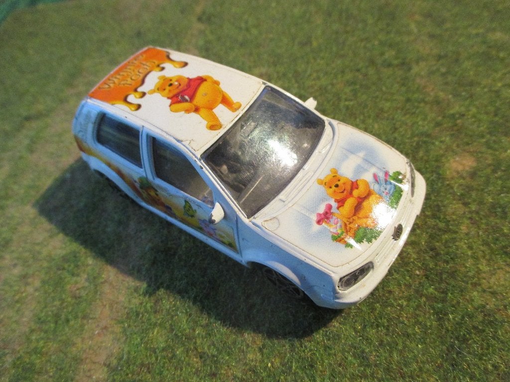 1:43 Volkswagen Golf Mk.4 GTi - Bburago Winnie de Pooh, Ophalen of Verzenden, Gebruikt, Auto, Overige merken