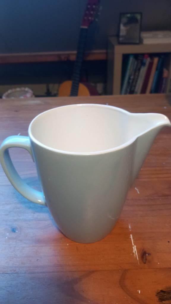 Vintage lichtblauwe kan met handvat, Ophalen