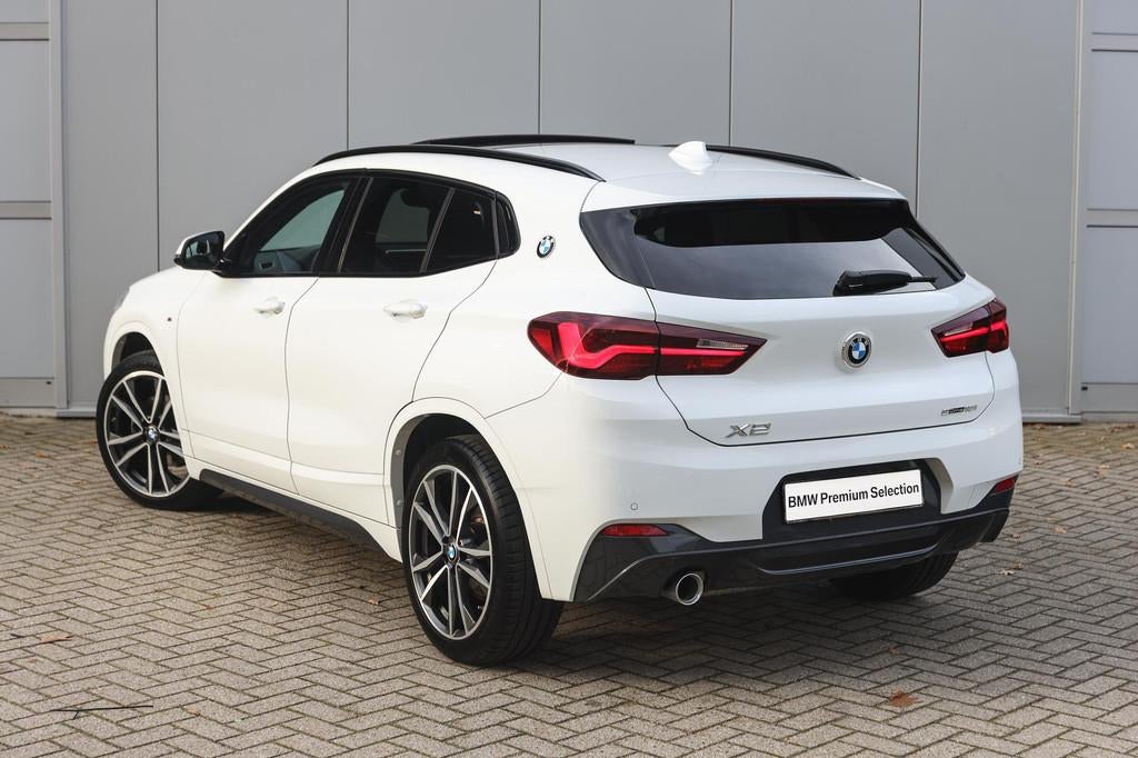 BMW X2 sDrive18i M Sport Automaat / Panoramadak / Trekhaak /, 745 kg, Gebruikt, Met garantie (alle), Wit