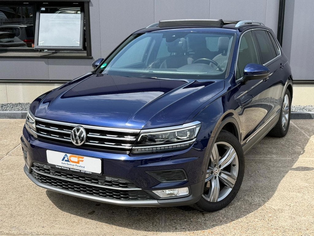 Volkswagen Tiguan 1.4 TSI ACT Highline / DIGI DASH/PANO/DYNA, Zwart, 4 cilinders, 150 pk, Blauw