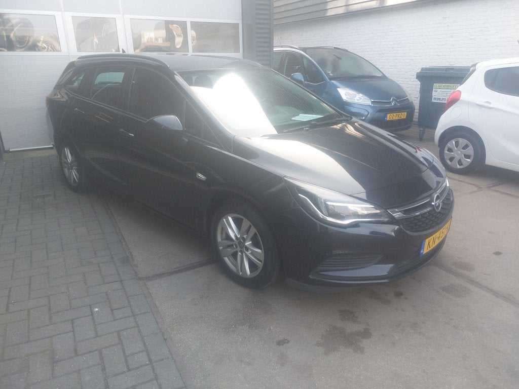 Opel Astra Sports Tourer 1.6 CDTI Edition MOTORPROBLEEM AIRC, Auto's, Opel, Voorwielaandrijving, Stof, Gebruikt, 4 cilinders