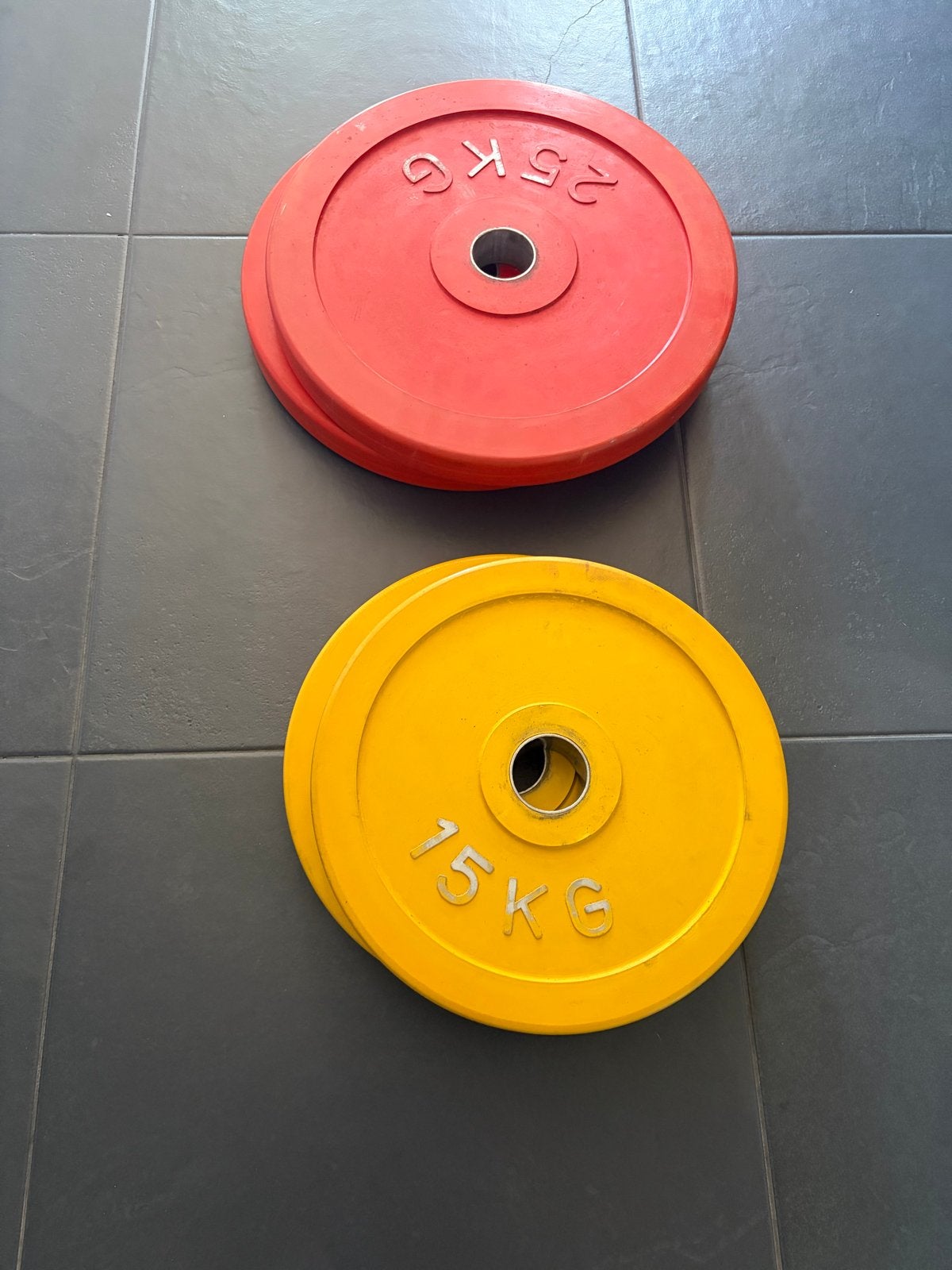 Set van 4 Olympische Halterschijven (2x15kg, 2x25kg), Sport en Fitness, Fitnessmaterialen, Ophalen, Gebruikt, Halterschijven