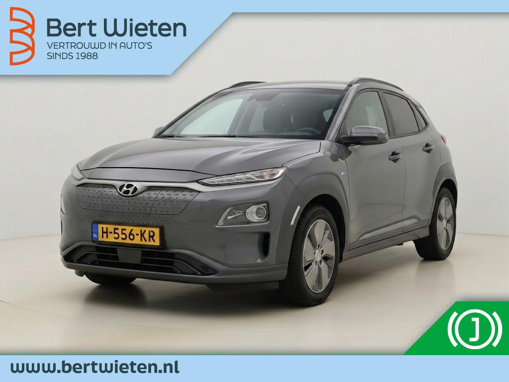Hyundai KONA EV Fashion 64 kWh | Geen import | Navi | Camera, Auto's, 0 cilinders, Gebruikt, Zwart, Adaptive Cruise Control